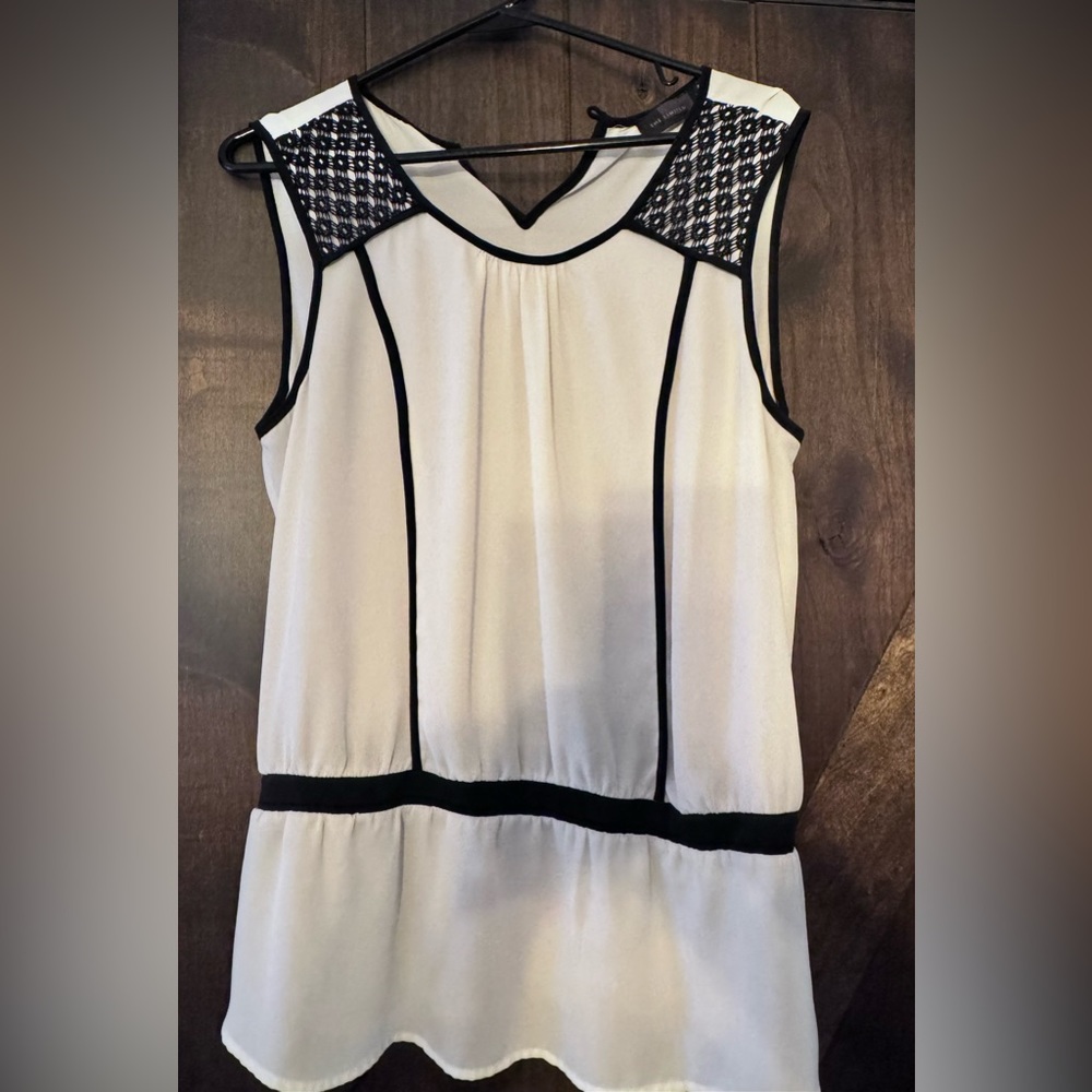 Limited sleeveless dress blouse